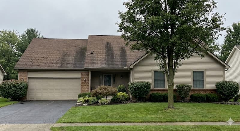Worn asphalt shingle roof showing signs of age and weathering in Westerville, Ohio