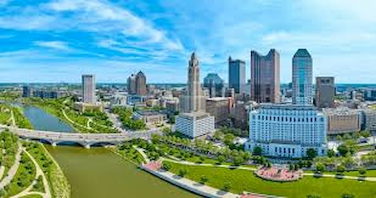 Columbus Ohio skyline with residential roofing in the foreground