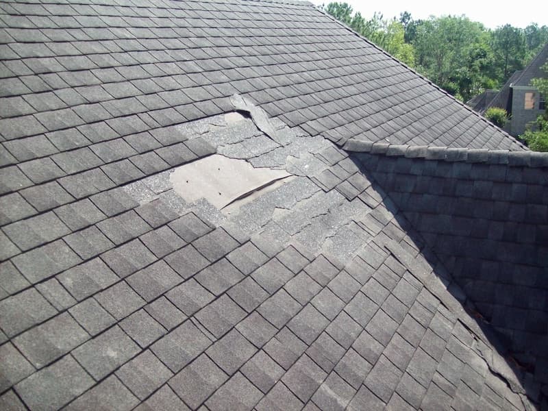 Storm damage to roof that can cause water leaks and ceiling stains